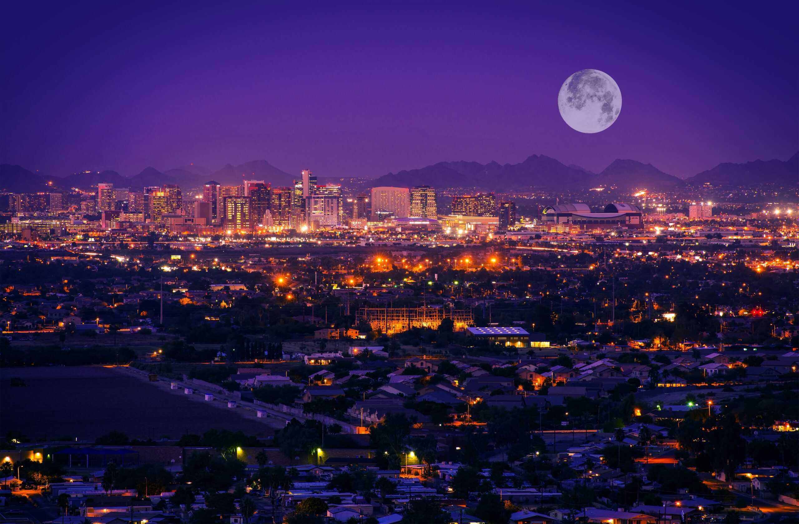 Phoenix, Arizona Skyline At Night. Full Moon Over Phoenix, Arizona.